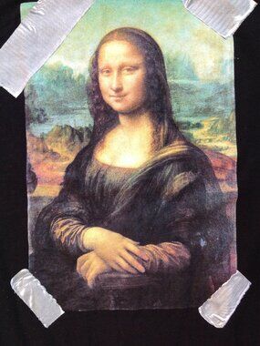 Mona Lisa by Old Navy and  Leonardo da Vinci Taped on Masterpiece (L)